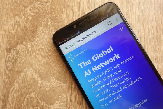 KONSKIE, POLAND - JULY 08, 2018: SingularityNET (AGI) cryptocurrency website displayed on Huawei Y6 2018 smartphone