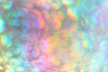 Color neon gradient. abstract blurred background. silver paper with a holographic effect. close up...