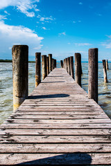 Fototapeta premium Wooden mole on the lake