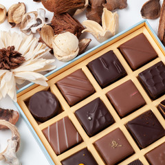 Natural chocolate candies in a beautiful cardboard box.