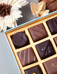 Natural chocolate candies in a beautiful cardboard box.