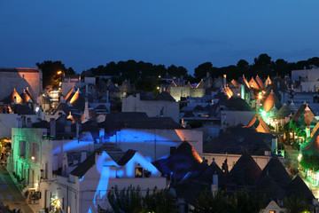 Night View of typical trulli houses in Alberobello Italy