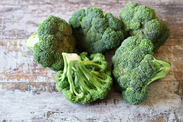Fresh broccoli heads. Vegan diet concept. Benefits of eating broccoli.