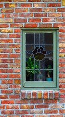 Red bricks wall and window