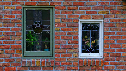 Fototapeta na wymiar Red bricks wall and window