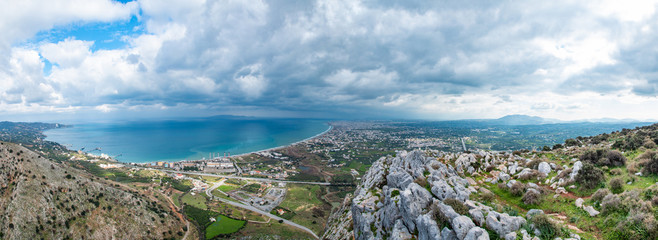 Panoramic view From a hill sea and mountains. View from mountains. Greece, Crete, Heraklion, Ammoudara.