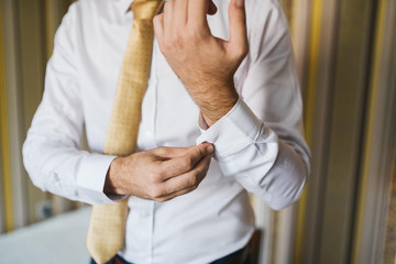 Business man getting ready for work