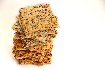 proper nutrition mountain of cookies with cereals flax seeds on a white background