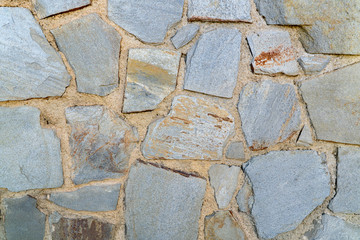 Texture of a stone wall. Old castle stone wall texture background. Stone wall as a background or texture.