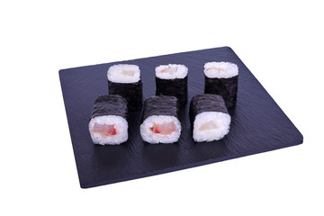 Traditional fresh japanese sushi maki on black stone Maki Izumi on a white background. Roll...