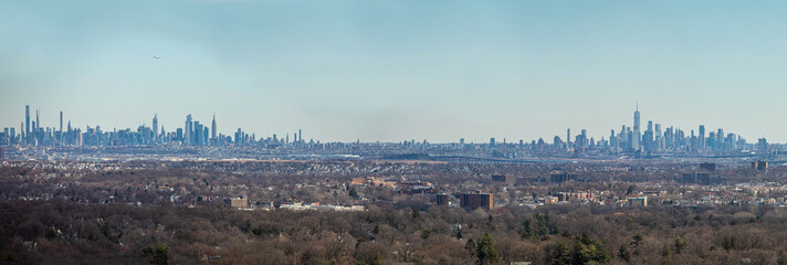 Panorama of New York City at day from far away hill