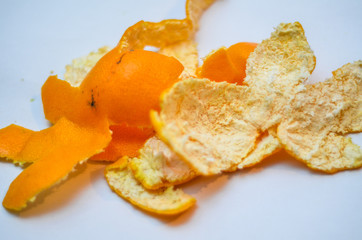 Tangerines or clementines with green leaf on white background. Peeled tangerine or mandarin fruit isolated