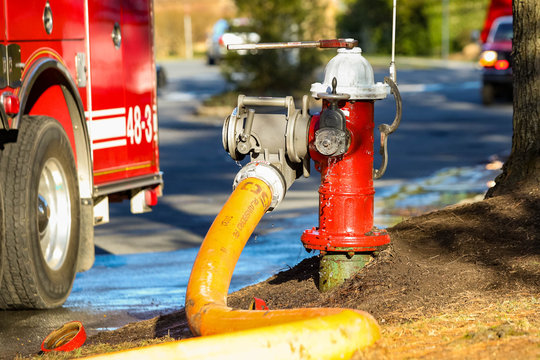 Fire hydrant water supply during emergency hooked to hose