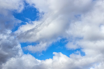 Obraz premium White clouds on a blue sky on a Sunny day