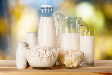 Glass of milk and dairy products on the desk