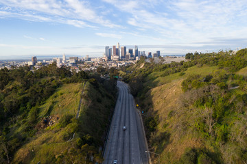 Aerial view of empty freeway streets with no people in Los Angeles California USA as result of ...