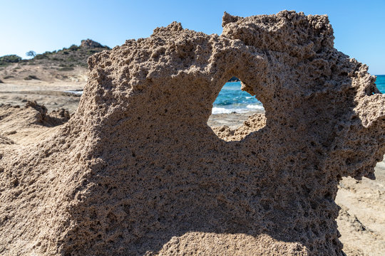 Rock with a wind hole in Pachena beach