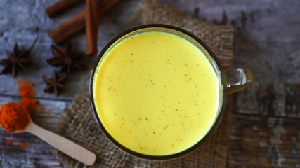 Turmeric milk. Healthy milk drink. Antiviral drink with milk and turmeric.