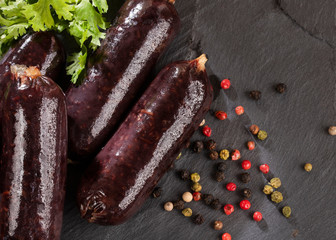 Whole blood sausage. Meat product in natural intestine casings