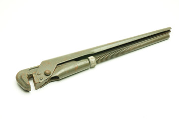 Adjustable wrench on a white background