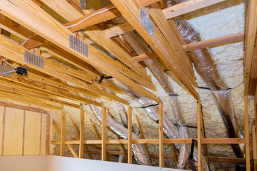 Thermal insulation a new house under the roof of air conditioning on the roof