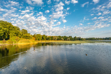 Early morning view of  South shore of Töölönlahti bay. Nice weather with Scattered clouds. Helsinki, Finland