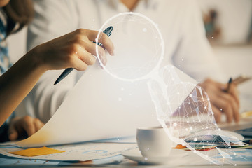 Double exposure of creative drawing over people taking notes background. Concept of startup