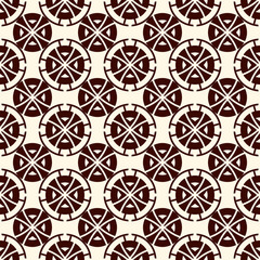 Ethnic, tribal wallpaper. Repeated segmented circles seamless pattern. Openwork ornament. Delicate ornamental background