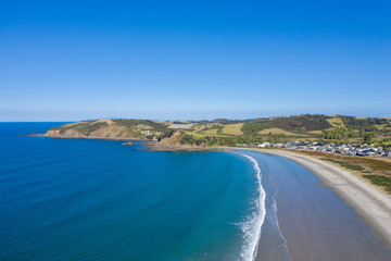 Aerial View from the Beach, Bay, Green Trees and Sea of Omaha in New Zealand - Auckland Area	 - obrazy, fototapety, plakaty