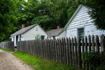 old wooden picket fence outside house in the village Discovery Harbour Ontario Canada