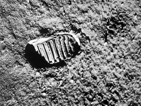 Astronaut's boot print on lunar (moon) landing mission. Elements of this image furnished by NASA.