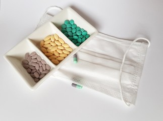 pills in bottle on white background