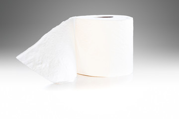 Toilet paper roll isolated on grey background