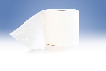 Toilet paper roll isolated on blue background