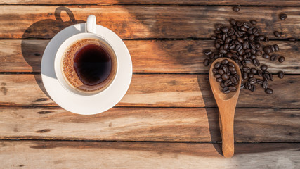Dark rose Coffee Beans and coffee cup Background