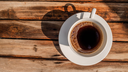 Dark rose Coffee Beans and coffee cup Background
