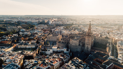 Aerial view of center of Seville, Andalusia, Spain.Old city with view on Alcazar, Grand royal bullring and city hall.Panoramic sight of Seville with famous landmarks.Gothic cathedral and La Giralda
