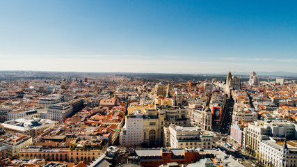 Obraz premium Aerial view of Calle de Alcala and Calle Gran Via.Panoramic aerial view of Gran Via, main shopping street in Madrid, capital of Spain, Europe.Tourist attraction and most famous street.