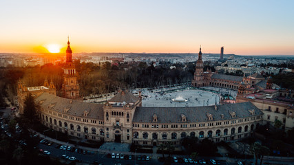 Aerial view of Plaza de Espana famous decoration with ceramic tiles, Seville (Sevilla), Andalusia, Spain.Sunset on Spain Square.Landmark square with a large water feature and ornate pavilion