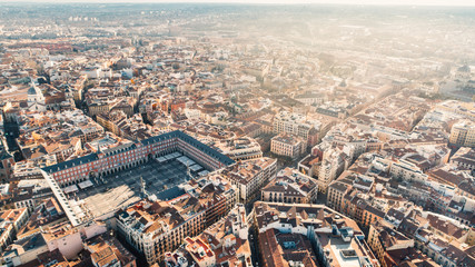 Aerial view of Plaza Mayor in Madrid,Spain. Plaza Mayor is a central plaza in the city of Madrid. Beautiful sunny day in city,architecture and landmark of Madrid. Center of capital of Spain © eldarnurkovic