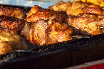 cooking barbecue on the street. meat food. quick snack
