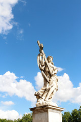 Fototapeta na wymiar Angel Carrying the Cross by Ercole Ferata at Castel Sant'Angelo, Rome, Italy