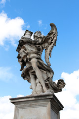 Fototapeta na wymiar Angel Carrying the Column by Antonio Raggi at Castel Sant'Angelo, Rome, Italy