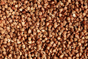 Buckwheat texture close up. Deficiency of essential goods