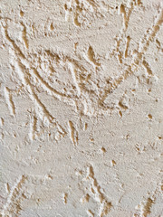 beige textured decorative stucco background with place for text