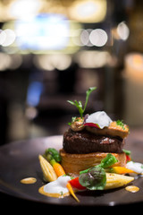 Grilled veal topped with foie gras
