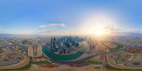 360 panorama by 180 degrees angle seamless panorama of aerial view of Dubai Downtown skyline and...
