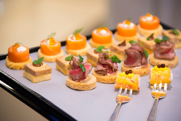 selective of canape on slate platter