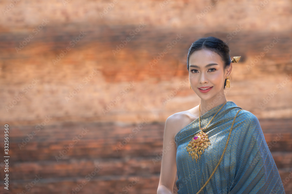 Wall mural asian women wearing in thai dress costume traditional according thai culture and tradition at ayutth