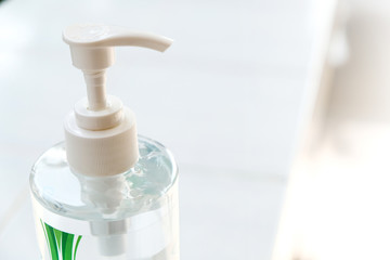 Fototapeta na wymiar Bottle of alcohol gel to wash hands to kill the corona virus